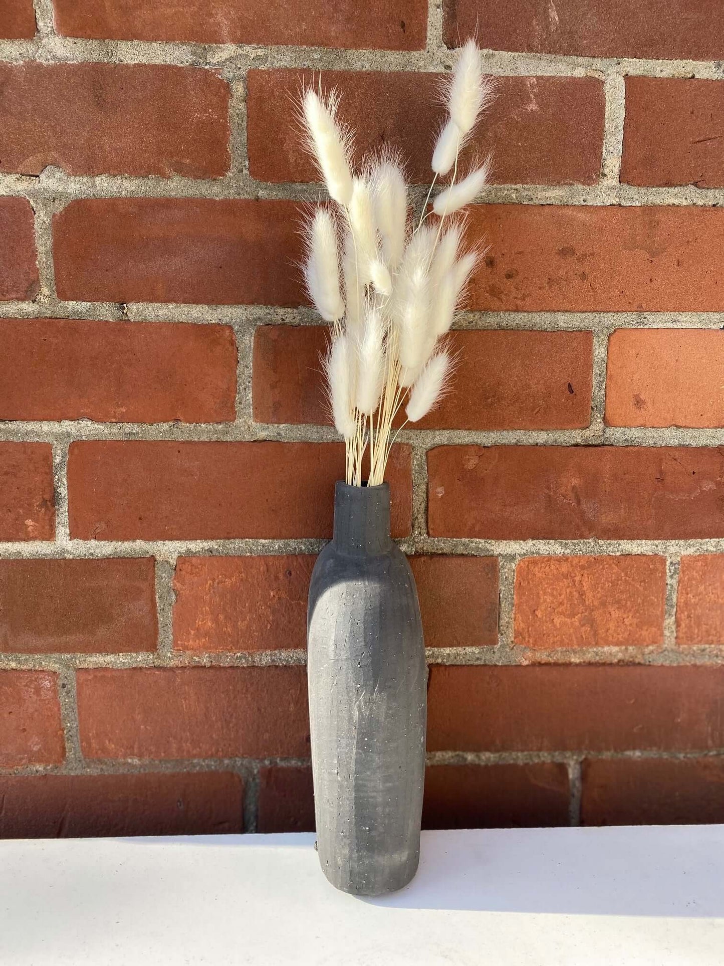 White Bunnytails in Black Rustic Bookend Budvase, by Lou-Lou's Flower Truck