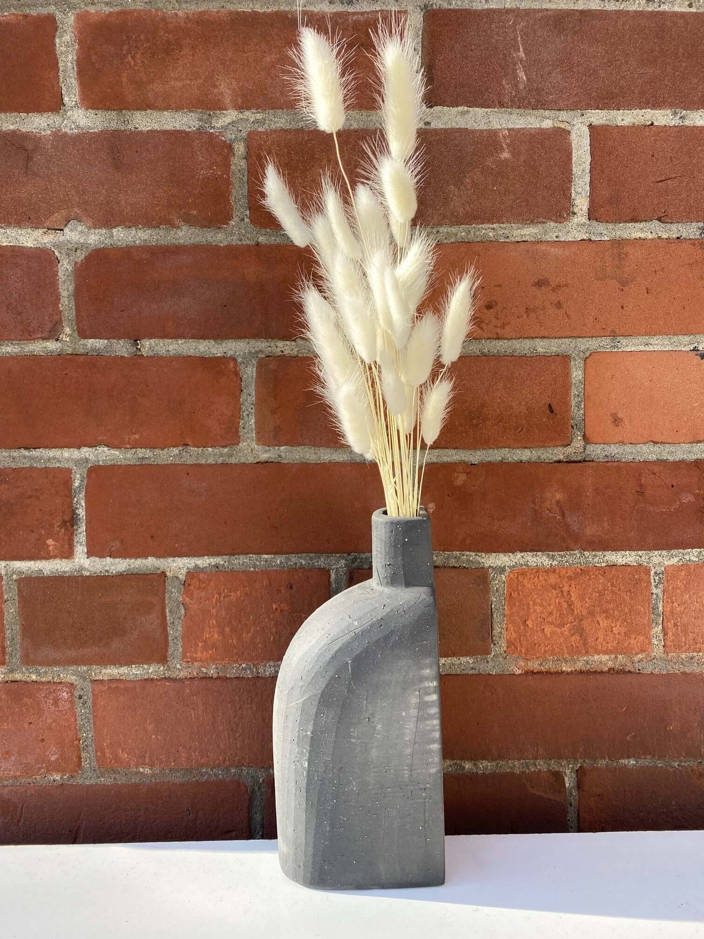 White Bunnytails in Black Rustic Bookend Budvase, by Lou-Lou's Flower Truck